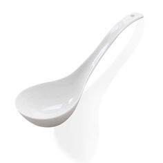 a white porcelain spoon on a white background