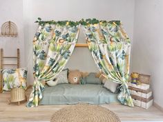 a child's bedroom with a canopy bed and stuffed animals