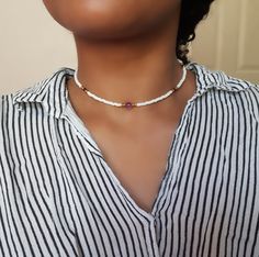 Amethyst Choker, Gold Bead Choker, Gemstone Choker, Stone Choker, Dainty Gold Choker, Boho Bead Choker, Amethyst Necklace  L E N G T H  This choker is avaliable in the following sizes:  11 inches 11.5 inches 12 inches 12.5 inches  13 inches 13.5 inches 14 inches Each necklace also has a 2" extension chain.  M A T E R I A L S  This Choker is made with: Seed beads  Fire-polished Czech beads  (1) 6mm Amethyst Gemstone  Durable Stretch Cord  Q U E S T I O N S  If you have any questions, feel free to Cheap Festival Choker With Spacer Beads, White Beaded Amethyst Jewelry, White Amethyst Spiritual Necklace, Spiritual White Amethyst Necklace, Amethyst Choker, Choker Gold, Gemstone Choker, Stone Choker, Bead Choker