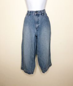 This is a pair of capri/cropped Lee Riveted jeans. They are high rise with all the fun details of carpenter jeans. Loops and pockets and wide belt loops add interest. Faded medium blue wash. Size 10 M. Check measurements carefully. Measurements taken with jeans laying flat and doubled where appropriate. In order to determine fit we recommend comparing measurements with an item that fits you well. Length 29 inches Waist 32 inches Hips 40 inches Inseam 19 inches Rise 10 inches Always happy to answ Retro Spring Cargo Jeans In Denim, Retro Wide Leg Denim Cargo Jeans, Retro Wide-leg Denim Cargo Jeans, Retro Wide Leg Cargo Jeans For Spring, Medium Wash Wide Leg Cropped Jeans With Belt Loops, Trendy Medium Wash Cropped Leg Cargo Jeans, Vintage Cargo Jeans In Denim Blue For Spring, Vintage Denim Blue Cargo Jeans For Spring, Spring Cropped Leg Flare Jeans