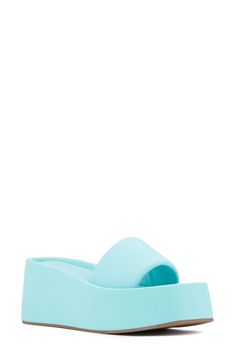 With a cushy insole, this casual slide sandal offers lasting comfort to be a weekend wardrobe favorite. 3 1/2" heel Textile upper and lining/synthetic sole Imported Comfortable Summer Slides With Wedge Heel, Casual Blue Platform Slippers With Round Toe, Casual Open Toe Foam Platform Slippers, Casual Foam Platform Slippers With Open Toe, Casual Blue Platform Slippers For Summer, Blue Round Toe Platform Slippers For Spring, Casual Foam Slide Sandals, Blue Synthetic Platform Slippers For Summer, Light Blue Synthetic Slip-on Slides