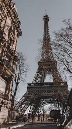 the eiffel tower in paris, france is seen from below it's base