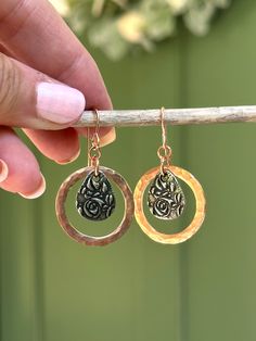 These beautiful hammered copper dangle earrings are eye-catching and sparkly. A pressed artisan pewter teardrop hangs in the center. They measure 1 inch in diameter and hang 1.5 inches from the ear. Copper, just like a penny, will oxidize (darken) to your own unique shade based on your body’s chemistry, air, oils, lotions, perfumes etc. While some like to keep their jewelry’s unique patina, it is very easy to restore the copper shine. Simply make a small paste of equal parts salt and white vineg Hand Forged Teardrop Metal Jewelry, Hand Forged Metal Teardrop Jewelry, Bronze Teardrop Metal Jewelry, Handmade Bronze Teardrop Metal Earrings, Handmade Bronze Metal Teardrop Earrings, Nickel-free Bronze Teardrop Jewelry, Nickel-free Metal Teardrop Pendant Jewelry, Bohemian Hammered Teardrop Jewelry, Bohemian Teardrop Hammered Jewelry