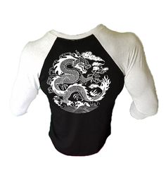 Check out our website for ALL of Iron Gods Clothing! https://irongodsapparel.com Iron Gods Dragon Series Logo Workout T-Shirt Iron Gods-Officially Branded Workout Tee Hey guys. This is our Official Clothing Line & i'm bringing it to Etsy. Check us out on instagram @irongods14, Tiktok @irongods and come join the family. The Best Men's Gym Clothing Around, Period. The Official Logo For The Dragon Series. This Line Will Be Dedicated To Martial Arts Masters Old & New. Be On The Lookout For Our Next Release! The Dragon Series Logo Workout Shirt Is Made From A Comfortable & Durable 60/40 Poly/Cotton Blend. This T-Shirt Is Screen Printed In-House And Comes On A White Sleeve/Black Body Raglan With The Dragon Logo On The Back & A Badge Sized Iron Gods Crest On The Front. Superior Quality Men's Gym White Graphic Print Raglan Sleeve Top, White Raglan Sleeve Top With Graphic Print, Graphic Print Raglan Sleeve Tee, White Band Merch Tops With Back Print, Graphic Tee With Screen Print And Raglan Sleeves, White Graphic Tee With Raglan Sleeves, Raglan Sleeve Screen Print T-shirt For Streetwear, God Clothes, Weightlifting Shirts