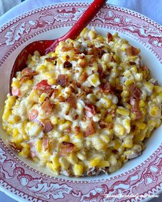 a bowl filled with macaroni and cheese covered in bacon