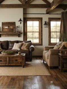 a living room filled with furniture and windows