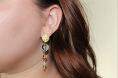 The Rylee is an elegant dangle earring that can show elegance and sophistication to any occasion! Elegant Formal Chandelier Earrings With Dangling Beads, Elegant Beaded Drop Earrings For Formal Occasions, Formal Long Drop Dangling Beads Earrings, Formal Long Drop Earrings With Dangling Beads, Elegant Formal Beaded Drop Earrings, Elegant Handmade Clip-on Earrings For Formal Occasions, Elegant Formal Beaded Earrings For Pierced Ears, Elegant Handmade Crystal Earrings For Formal Events, Elegant Chandelier Earrings With Dangling Beads For Evening