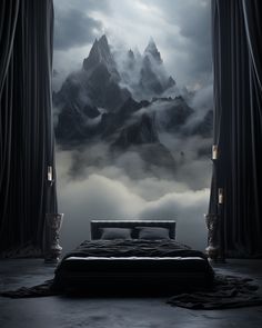 a large bed sitting in front of a window covered in fog and clouds with mountains behind it