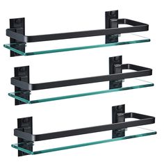 two glass shelves with black metal brackets