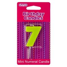 a birthday candle with the number seven on it