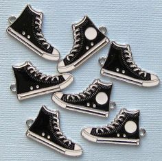 High top running shoe silver tone charms, in a zinc alloy metal and enamel. Perfectfor bracelets, pendants, earrings, zipper pulls, bookmarks and key chains! Measurements: 30mm x 17mmHole Size: 2mm You will receive 5 charms. Need more? Just send us a message through the contact us form, instant chat, or at mailto:info@bohemianfindings.com. Bulk pricing is available! All of our products are lead free and nickel safe. As they contain small parts, all items are for adult jewelry/craft making use on White Converse Style, Black And White Converse, Converse Style, White High Tops, Charms Bracelet, White Converse, Silver Shoes, Enamel Charms, Shoe Charms