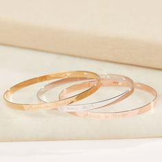 Treasure the moments that made you with our bestselling Personalized Flat Bangle. Adjustable for the perfect fit, this slim and contemporary design is hand-engraved with fine, discreet writing of the message that means the most to you.18K Champagne Gold Plated, 925 Sterling Silver or 18K Rose Gold PlatedCircumference adjustable to 6.1, 6.5 or 7.1Width: 0.16Hand-engraved in our Paris workshopSent with love in a complimentary gift boxAny slight variations in lettering depth, spacing and alignment Adjustable Bracelets With Shiny Finish For Wedding, Minimalist Bracelet With Shiny Finish For Anniversary, Engraved Minimalist Bracelets, Minimalist Engraved Round Bracelets, Minimalist Adjustable Engraved Bangle, Minimalist Engraved Name Bangle Bracelet, Adjustable Minimalist Engraved Bangle, Minimalist Engraved Round Bangle, Elegant Adjustable Bangle With Engraving Option