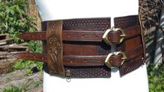 Belt with double buckle and celtic decorations warrior waistband Larp Cosplay theater belt in pure leather high waist belt armor belly-band Medieval Corset Belt For Festivals, Medieval Style Corset Belt For Festivals, Medieval Corset Belt For Larp With Belt Loops, Steampunk Leather Corset Belt For Cosplay, Waist Armor, Pirate Belt, Gladiator Helmet, Medieval Helmets, Double Belt