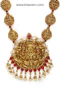 22 Karat Gold 'Lakshmi' Necklace & Drop Earrings Set with Color Stones ,Japanese Culture Pearls, Beads & Pearls (Temple Jewellery) - 235-GS3461 - in 67.250 Grams for USD $5062.43. 
Made in India by Totaram Jewelers Online this product is in Gold - 22 Karat BIS Hallmark 916 KDM Gold  & is an excellent gift for Adult - Women. Ships fully insured with secured guaranteed delivery for free with your order over $250 from New Jersey USA & comes with 30 days exchange policy. Yellow Gold Kundan Necklace For Diwali, 22k Yellow Gold Chandbali Kundan Necklace, 22k Gold Temple Necklace With Chandbali Shape For Celebration, 22k Gold Chandbali Temple Necklace With Meenakari, Yellow Gold Chandbali Kundan Temple Necklace, 22k Gold Chandbali Temple Necklace For Celebration, Hallmarked Gold Plated Temple Necklace For Diwali, 22k Gold Temple Necklace For Navratri Celebration, 22k Gold Temple Necklace For Celebrations, Chandbali Style