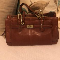 Never Been Used. Coach Leather Handbag. Brown Coach Shoulder Bag With Branded Hardware, Vintage Brown Coach Shoulder Bag, Coach Brown Bags For On-the-go, Cheetah Purse, Versatile Coach Bag With Gold-tone Hardware, Brown Coach Bag With Turn-lock Closure, Vintage Coach Bags, Coach Shoulder Bag, Black Leather Handbags