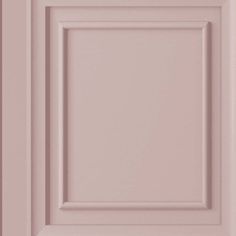 a close up view of a pink kitchen cabinet door