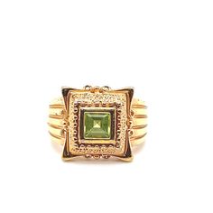 *Estate piece This exquisite Etruscan-style ring is a captivating piece of jewelry that beautifully combines historical charm with modern elegance. Crafted from sterling silver and plated with radiant gold, this ring features intricate detailing reminiscent of ancient Etruscan artistry. At its center, a vibrant peridot gemstone is set, adding a stunning pop of color and brilliance. The ring is a size 9, making it a perfect fit for those who appreciate fine craftsmanship and timeless design. Please note, we are unable to verify the authenticity of the peridot, but its beauty and allure remain undeniable. This ring is an elegant accessory for any occasion, celebrating the rich heritage of Etruscan jewelry. 8g Antique Gold Emerald Ring With Intricate Design, Art Deco Gold Ring With May Birthstone, Gold Art Deco Ring With May Birthstone, Gold Ring With May Birthstone In Art Deco Style, Elegant Green Ceremonial Rings, Ornate Yellow Gold Gemstone Rings, Elegant Stone-set Signet Ring For Formal Wear, Art Deco Gold Jewelry With Accent Stones, Gold Art Deco Jewelry With Accent Stones