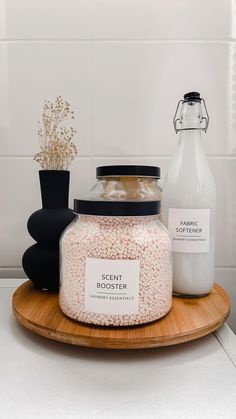 a wooden tray topped with a jar of bath salts