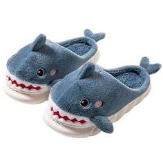 PRICES MAY VARY. Cute Shark Slippers: The design of the cartoon animal shark image makes the slippers full of cuteness, suitable for indoor home use, and can also be used by older children. Soft plush shoe body: Beautiful animal shark upper and ultra soft and warm plush lining, giving you a feeling of walking in the clouds. These comfortable home slippers are perfect for relaxing your tired feet when you come home from work. Memory foam insole: The thick multi-layer memory foam cushioning system Dinosaur Slippers, Shark Images, Shark Slippers, Animal Shoes, Animal Slippers, Cute Shark, Interesting Animals, Winter Slippers, Winter House