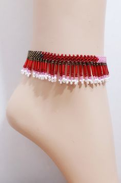 Handmade Boho Womens Girls Seed Bead Woven Geo Colorblock Adjustable Size Boho Fringed Anklet Native Tribal Red Jewelry Excellent Gift Beautiful handmade special fringed stitch....very complicated and GORGEOUS! Seed beads in red pinks white silver. Fringed anklet is adjustable with handmade bead ball and 3 loops 9 to 10 inches. Super high quality. Treasured gift comes in box. Easy to wear casual chic vintage for the disco sporting life. **Please note the color differences, color/contrast vary wi Adjustable Red Anklet For Beach, Pink Beaded Bohemian Anklets, Bohemian Red Beaded Anklets, Pink Bohemian Beaded Anklets, Adjustable Red Anklets For Festivals, Traditional Red Beaded Bracelets For The Beach, Red Bohemian Anklets For The Beach, Red Bohemian Anklets For Beach, Multicolor Beaded Anklets For Party