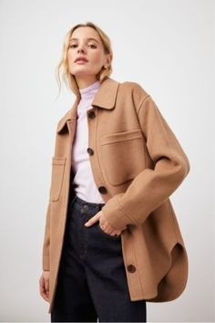 This oversized shirt jacket by Rails is the perfect fusion of cozy and chic! This style features a dropped shoulder, patch pockets, horn buttons, and side slits at the hem for breathability. Available in a rich camel-colored wool blend. Oversized Beige Shacket With Lapel Collar, Trendy Workwear Shacket With Patch Pockets, Trendy Shacket With Patch Pockets For Work, Casual Wool Coat With Button Cuffs For Fall, Trendy Oversized Wool Outerwear, Neutral Outerwear With Patch Pockets And Long Sleeves, Neutral Long Sleeve Outerwear With Patch Pockets, Chic Oversized Shacket For Work, Oversized Wool Button-up Outerwear