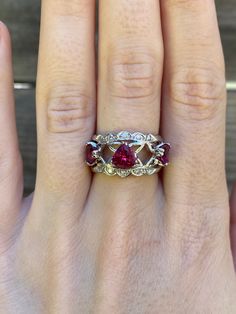 Total Weight: 5.1 grams Size: 6.75 Band Width: 3.8-12.1mm  Pink Tourmaline: 6x6mm & 5x5mm Condition: In great condition showing little wear with no damage.  All gold has been thoroughly checked with an Olympus XRF spectrometer. It is guaranteed 14k gold.  All our jewelry is properly washed and disinfected to ensure customers get clean items with every order.  Returns accepted but may be subjected to a restock fee.  Please message with any questions:) Heart Cut Multi-stone Diamond Rings, Heart Cut Multi-stone Anniversary Rings, Exquisite Ruby Jewelry Gia Certified, Gia Certified Diamond Jewelry With Trillion Cut, Gia Certified Trillion Cut Diamond Jewelry, Gia Certified Trillion Cut Jewelry For Formal Occasions, Fine Jewelry Heart Cut Multi-stone Rings, Fine Jewelry Ruby Ring With Accent Stones In Platinum, Formal Trillion Cut Multi-stone Jewelry