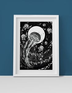 a black and white illustration of jellyfish floating in the ocean on a blue wall