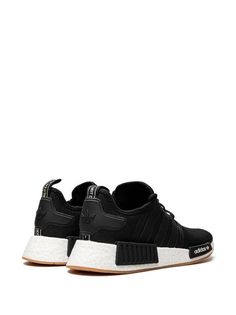 Adidas NMD_R1 Primeblue "Core Black/Core Black/Gum" Sneakers - Farfetch Sporty Sneakers With Logo Patch For Streetwear, Custom Lace-up Sneakers With Logo Patch For Streetwear, Urban Custom Lace-up Sneakers With Logo Patch, Urban Sneakers With Logo Patch And Round Toe, Sporty Running Shoes With Logo Patch, White Sole Running Shoes For Streetwear, Streetwear Sneakers With Logo Patch And Round Toe, White Sole Running Shoes With Laces For Streetwear, Urban Sneakers With Logo Patch For Streetwear