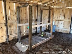 an unfinished bed frame in the middle of a room with wood walls and flooring