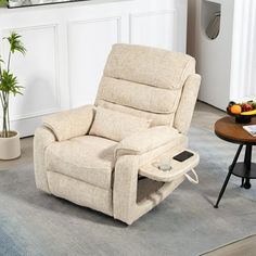 a living room with a couch, chair and coffee table