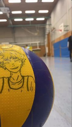 an inflatable ball with a drawing of a boy on it