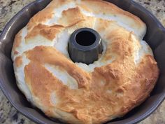 a bundt cake sitting in a pan on top of a counter