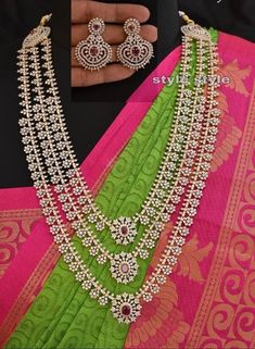 Beautiful jewelry set can be used for various events/ function like engagement, Marriage , Half saree function , housewarming and much more . Item Detail 👇🏼 ⭐️Long haram length -32cm      Long haram weight -237g ⭐️long haram has 3 layers with Ruby stones and it comes with a beautiful earring . ⭐️All the necklace comes with extension chain so the length can be adjusted accordingly. PRODUCT CARE: - Avoid contact with heat/fire, water, and chemicals such as perfumes or any sprays to prevent product damage.  - Store it in provided white base cover & box Saree Function, Half Saree Function, Long Haram, Rani Haar, Replica Jewelry, Bridal Diamond Jewellery, Fire Water, Bridal Gold Jewellery Designs, Ruby Stone