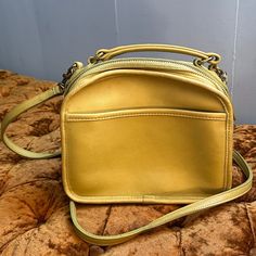 Rare Vintage Coach Light Lime Green Lunchbox Purse. Condition Is Pre-Owned, Like New. Color Is A Light Pale Lime Green- This Is Hard To Photograph. Photos Might Differ In Color Due To Angle/Lighting. Main Photo Displays Accurate Color. I Added A Stock Image Of An Ad For The Purse That Displays The Color Also. Message Me For Any Questions! Light Lime Green, Coach Lights, Vintage Coach, Photo Displays, Coach Bags, Lime Green, New Color, Lunch Box, Stock Images