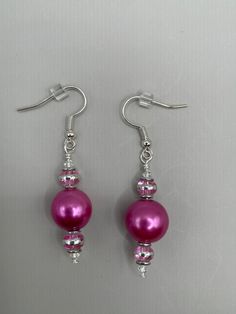 Round pink glass beads with pink and silver accents on silver ear wires Affordable Pink Round Bead Earrings, Cheap Pink Round Bead Earrings, Affordable Pink Round Beads Earrings, Diy Jewelry Unique, Glass Balls, Earrings Round, Pink And Silver, Sarasota Fl, Origami Art