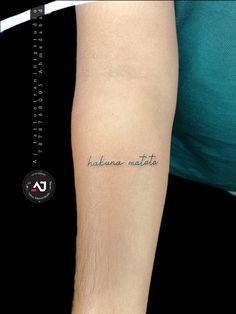 a person with a tattoo on their arm