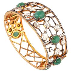 18KT Gold :3.170g Diamond:8.82ct SiIver:23.864g Emerald:11.39ct Size:48X58X30 MM Luxury Green Diamond Bangle Bracelet, Antique Emerald Bracelet, Luxury Green 14k Gold Bracelets, Luxury Vintage Green Cuff Bracelet, Luxury 17-jewel Bangle Cuff Bracelet, 18k Gold Bangle, Bangle Silver, April Birthstone Jewelry, March Birthstone Jewelry