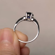 This is a gorgeous handmade creation. Its beauty is its simplicity & Elegance. The 6*8mm oval cut lab sapphire is crafted in solid sterling silver and with rhodium plated. It's made to order and it will take about 7 days to make it. All item is sent in a beautiful gift box You can realize more lovely stuff clicking the link https://www.etsy.com/shop/knightjewelry?refshopsection_shophome_leftnav Please leave the correct address and you phone number for delivering successfully. Elegant Oval Tanzanite Birthstone Ring, Tanzanite Oval Birthstone Promise Ring, Oval Tanzanite Birthstone Promise Ring, Oval Tanzanite Birthstone Ring With Accent Stones, Oval Sapphire Promise Ring, Oval Sapphire Promise Ring In 14k White Gold, Classic Oval Sapphire Birthstone Ring, Oval Tanzanite Birthstone Ring, Sapphire Sterling Silver Ring For Proposal