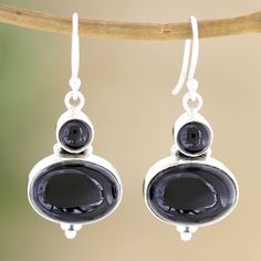 An elegant black tone reminiscent of a mysterious night embellishes the jewels of these dangle earrings crafted in India by Bhavesh's team. As jewelry experts, the artisans create sterling silver structures with a polished finish, later setting black onyx cabochons believed to protect against negative energies. Silver Onyx Earrings Perfect As A Gift, Elegant Onyx Dangle Earrings, Victorian Silver Onyx Jewelry, Nickel-free Silver Onyx Earrings, Black Enamel Onyx Drop Earrings, Onyx Earrings, Sterling Silver Dangle Earrings, Earring Crafts, Purple Stones