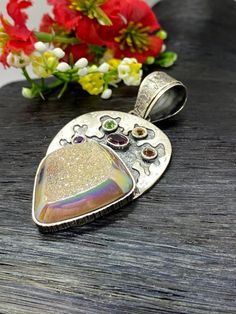 "ARTISAN RAINBOW DRUZY PENDANT Hand-made Sterling Silver 925. Stones used: Rainbow Druzy, Pink Tourmaline, Citrine, Green Sapphire, Garnet, Amethyst.. Height -2 9/16\" (including bail), Width - 1 1/16\" Height - 65mm (including bail), Width - 34mm Unique Handcrafted One-of a-kind Design Pendant Each Piece of Jewelry in my Collection is Absolutely One of a Kind! When you start wearing a piece of my jewelry you will fall in love with it more and more each day and feel that good Energy and Love tha Silver Bohemian Jewelry For Birthdays, Bohemian Silver Jewelry For Birthday, Bohemian Silver Jewelry For Birthdays, Handmade Sterling Silver Gemstones For Anniversary, Unique Sterling Silver Gemstones For Gifts, Handmade Pendant Jewelry For Birthday, Handmade Silver Fusion Gemstones, Unique Multicolor Gemstones For Gift, Unique Multicolor Gemstones As Gifts