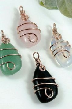 This beautiful pendant is created by wire wrapping Rose Quartz stone, Black Onyx Stone, Green Aventurine Stone and Opalite Stone. Rose Quartz: Besides being simply beautiful Rose Quartz is the stone of universal love. The stone is reputed to help the wearer attract love and keep it. It restores trust and harmony in relationships, encouraging unconditional love. #rosequartzpendant #rosequartzpendantaesthetic #rosependant #blackonyxpendant #greenaventurinependant #opalitependant Larp Ideas, Wired Jewelry, Green Aventurine Stone, Black Onyx Pendant, Attract Love, Aventurine Stone, Onyx Pendant, Stone Rose