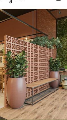 a magazine cover with some plants in large planters on the side of a building