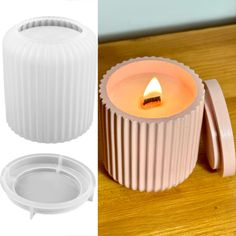 a candle that is sitting on top of a table next to a cupcake holder