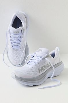 Ultra-cushioned and extra supportive, these Hoka Bondi 8 trainers feature a bumped up, lightweight sole and extended heel so you can run anywhere and everywhere. **Features:** Breathable mesh uppers, sockliner, lightweight foam midsoles, extended heel, pillowed tongue, pull-tab, durabrasion rubber outsole**Why We <3 It:** These super lightweight trainers are perfect for everyday running, walking, and overall foot support and comfort. Hoka Shoes Bondi 8, Hoka Bondi 8 White, Hokas Women Bondi 8, Bondi 8 Hoka, Womens Hoka Shoes, Hoka Bondi 8 Outfit, Preppy Running Shoes, Waterproof Hoka, Hoka Bondi Outfit