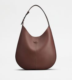 Tods Classic Leather Top Handle Hobo Bag, Formal Calf Leather Hobo Bag With Leather Handles, Classic Top Handle Hobo Bag For Business, Designer Soft Calf Leather Hobo Bag, Timeless Hobo Bag With Smooth Grain, Timeless Leather Hobo Bag With Top Handle, Luxury Soft Leather Hobo Bag For Business, Classic Calf Leather Hobo Bag With Smooth Grain, Classic Hobo Bag With Palladium Hardware For Work