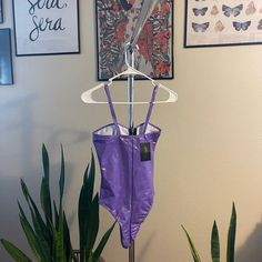 Frederick's Of Hollywood Purple Zip-Up Body Suit Size S Rave Festival/Fashion Nwt Purple Sleeveless Party Swimwear, Purple Lined Party Swimwear, Purple Lined Swimwear For Parties, Purple Party Swimwear With Lined Body, Trendy Stretch Purple Swimwear, Trendy Purple Stretch Swimwear, Purple Fitted Sleeveless Swimwear, Purple Lined Swimwear For Spring, Spring Purple Lined Swimwear