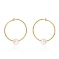 We’re picky about our pearls. Our collection of modern-feel pearl pieces takes your grandmother's favorites and incorporates them into the latest trends, interpreted from our NYC-gal perspective.These gem-quality pearls are natural freshwater beauties, set in solid 14k gold that won't tarnish or ... Timeless Round Pearl Earrings For Everyday, Minimalist Formal Hoop Earrings With Pearl Drop, Formal Minimalist Hoop Earrings With Pearl Drop, Modern Everyday Earrings With Pearl Charm, Timeless Everyday Pearl Earrings, Modern Pearl Charm Earrings For Everyday, Formal Minimalist Hoop Pearl Earrings, Minimalist Yellow Gold Pearl Hoop Earrings, Modern Everyday Pearl Drop Jewelry