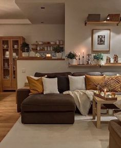 a living room filled with furniture and decor