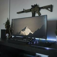 a desktop computer sitting on top of a desk next to a keyboard and mouse,