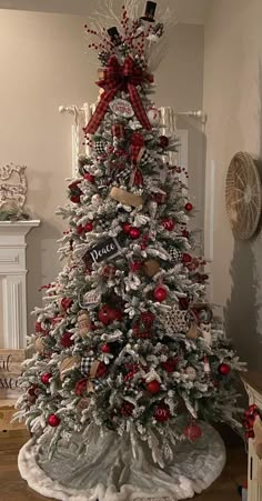 a decorated christmas tree with red and white ornaments